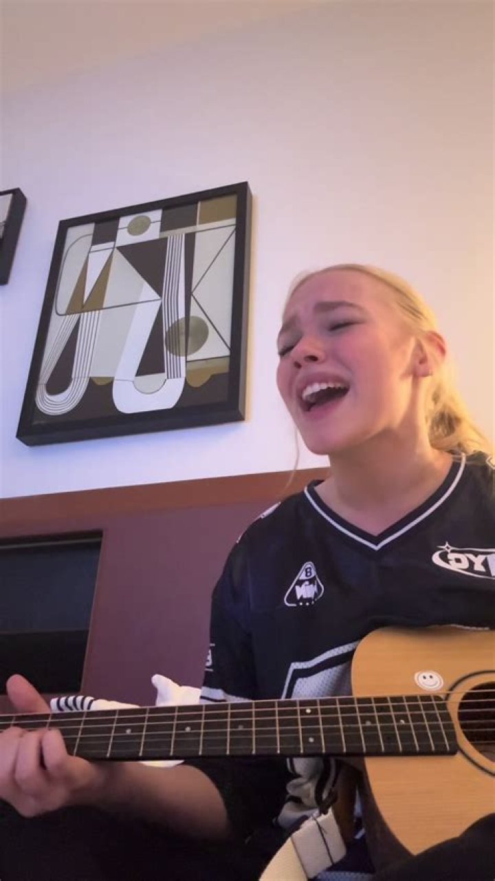 Freya Parks playing guitar Freya Parks playing guitar
