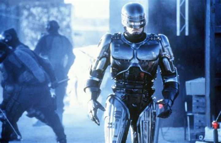 RoboCop and RoboCable in a standoff