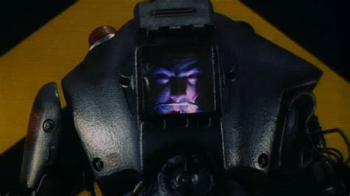 RoboCop prototype pulling his own head off.