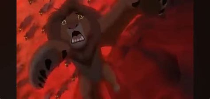 When Simba falls from exhaustion what animals encircle him?